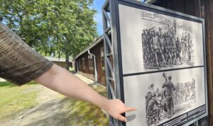 Auschwitz tour options – guide explaining history during visit to memorial site
