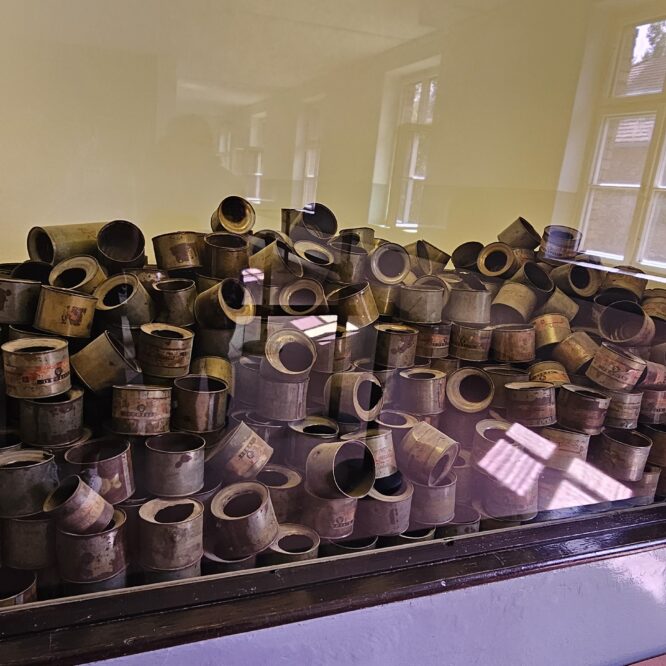 Auschwitz Museum history – Zyklon B canisters displayed at the Auschwitz-Birkenau State Museum