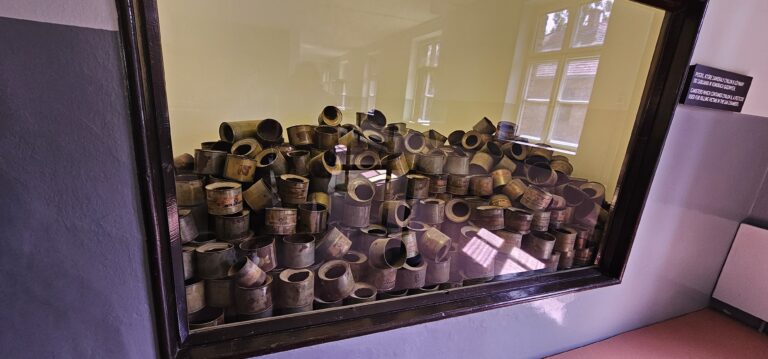 Auschwitz Museum history – Zyklon B canisters displayed at the Auschwitz-Birkenau State Museum